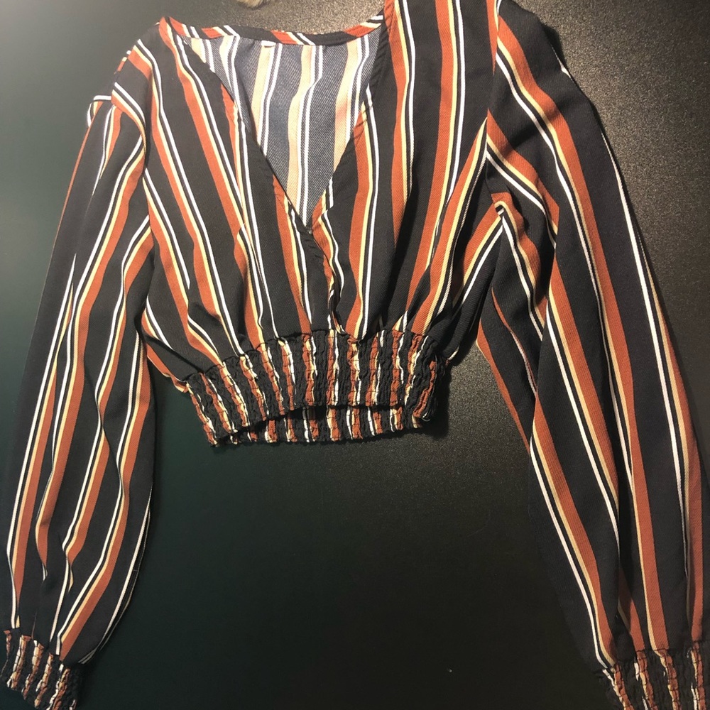 Pretty small crop top never worn need gone asap